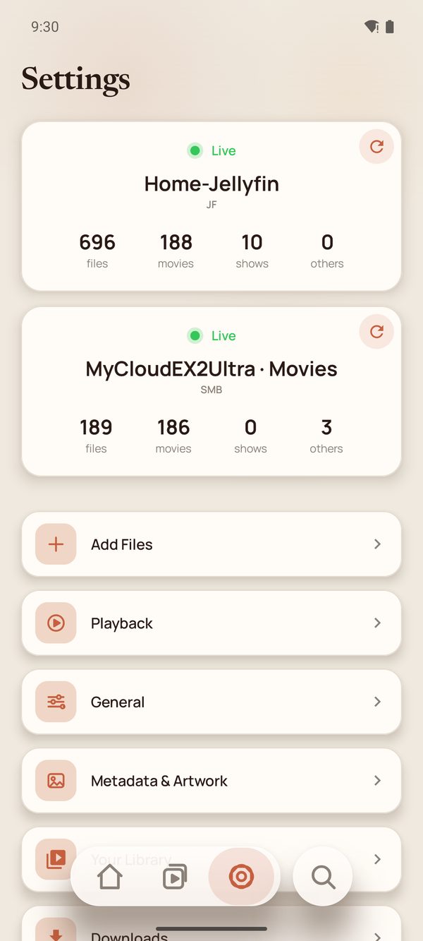 The Settings tab with two live source cards, a Jellyfin server and an SMB share.