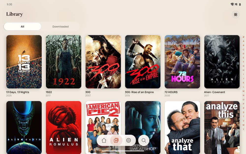 The Library tab on a tablet in landscape, showing six columns of posters.